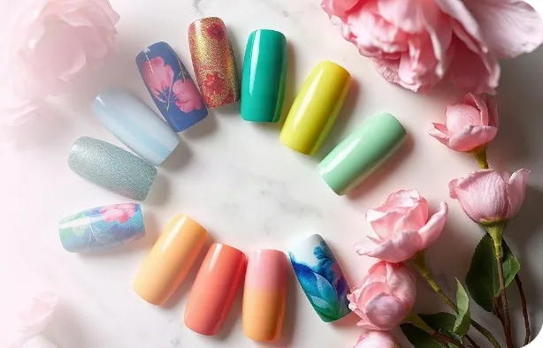 A ring of colourful press-on nail sets
